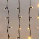 Фотография Гирлянда светодиодная Бахрома (Айсикл), 3,2х0,9м, 120 LED ТЕПЛЫЙ БЕЛЫЙ, черный КАУЧУК 3,3мм, IP67, эффект мерцания, 230В NEON-NIGHT (нужен шнур питания 315-000), артикул 255-336
